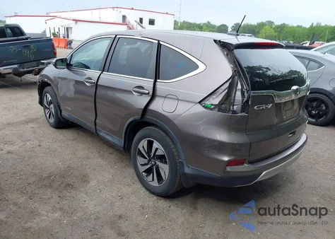 2015 Honda Cr-V Touring z USA, uszkodzony, nr VIN 5J6RM4H9XFL061928